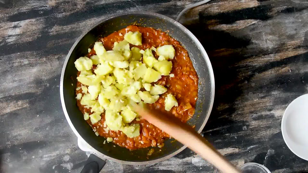 Image of the cooking step-4-10 for Aloo Poori Recipe - Puri Sabji - Aloo Ki Rasewali Sabzi