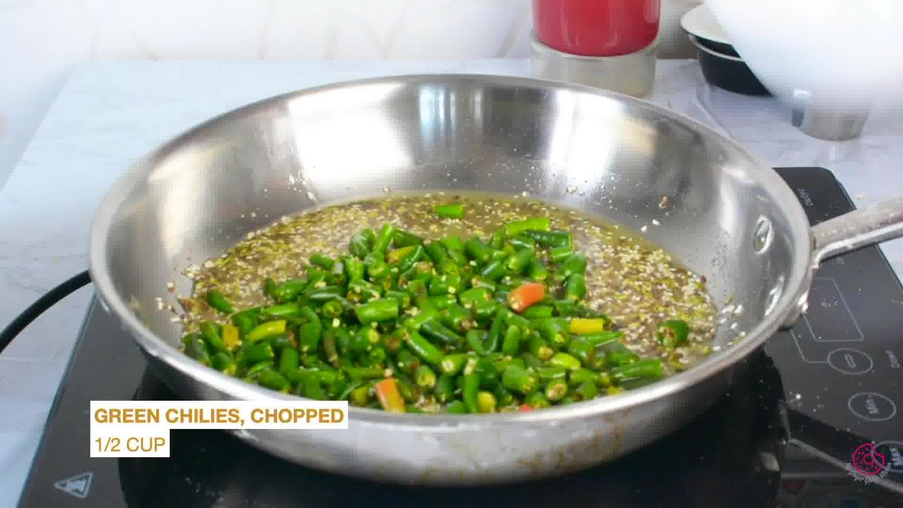 Image of the cooking step-1-6 for Besan Mirchi Ke Tipore - Garm Flour Green Chili Stir-Fry