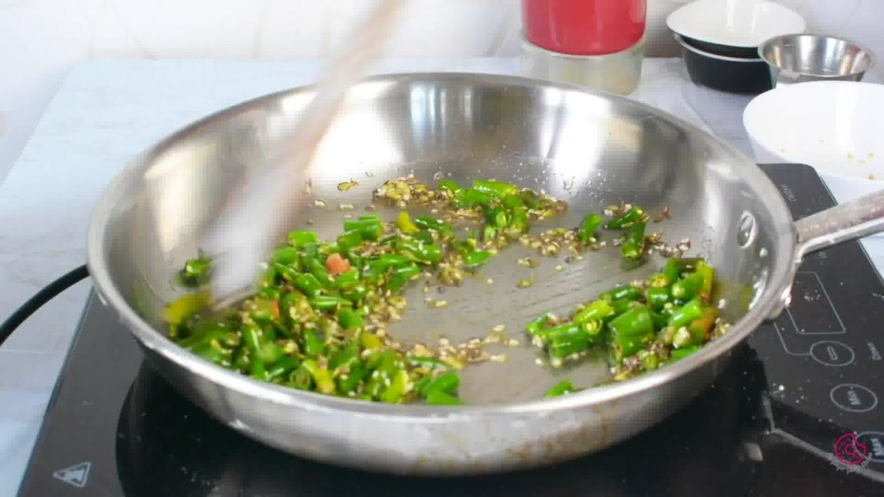 Image of the cooking step-1-7 for Besan Mirchi Ke Tipore - Garm Flour Green Chili Stir-Fry