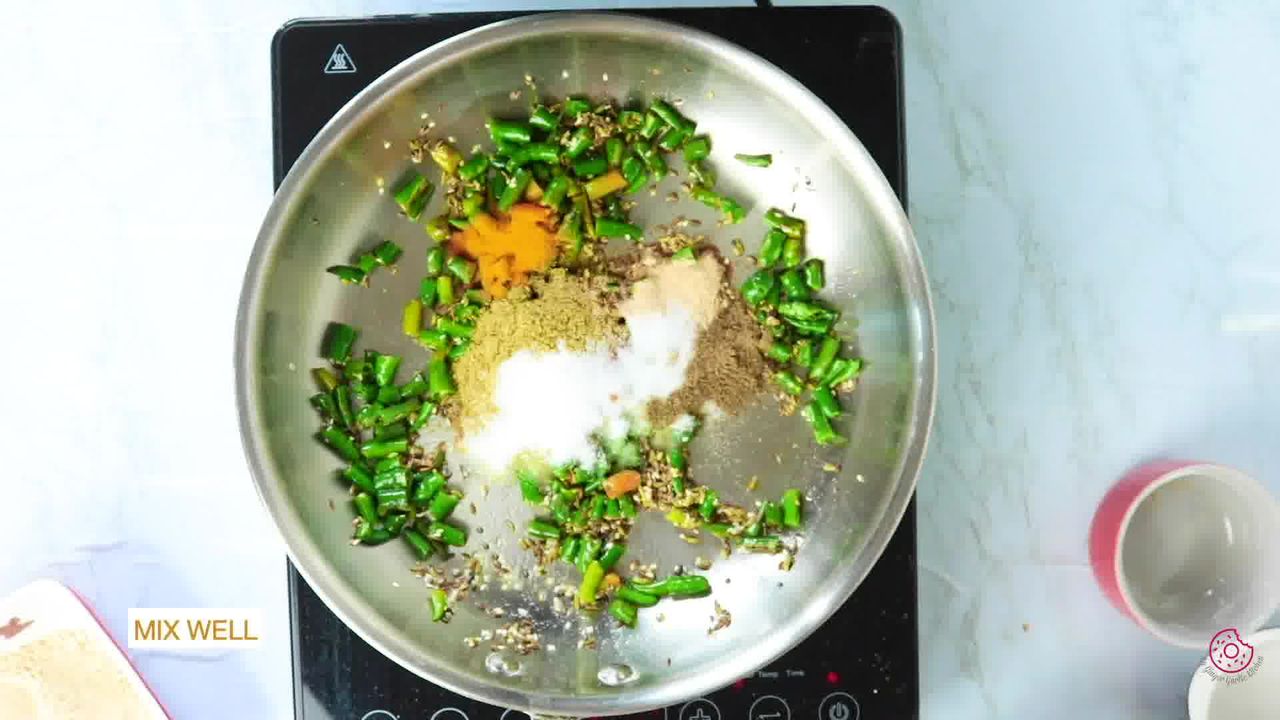 Image of the cooking step-1-8 for Besan Mirchi Ke Tipore - Garm Flour Green Chili Stir-Fry