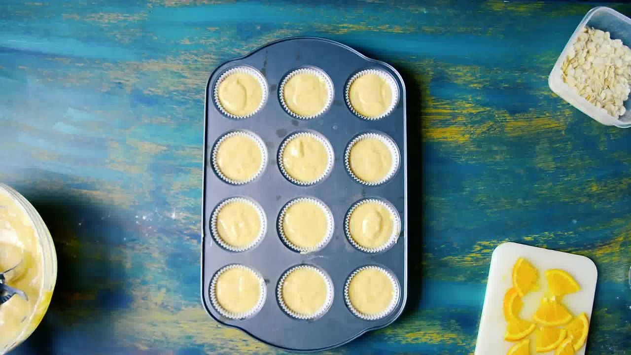 Image of the cooking step-1-6 for Orange Olive Oil Muffins Recipe - Eggless