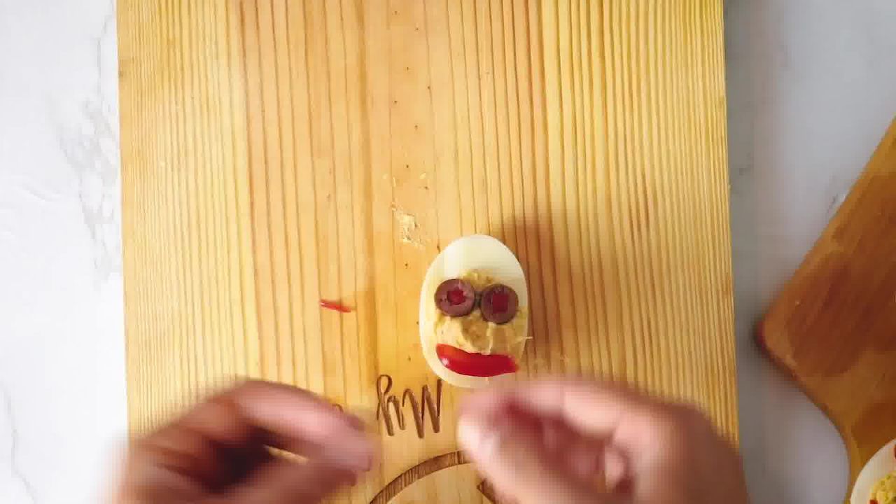 Image of the cooking step-10-2 for 7 Halloween Deviled Egg Ideas + Halloween Ghost Egg