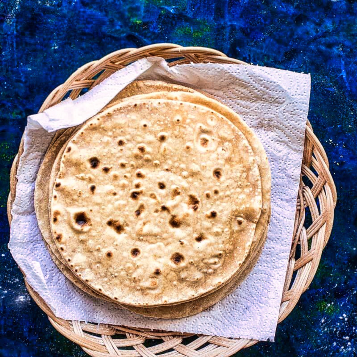 Image of Making Roti (Indian Chapati) On Roti Tawa Made Of Wheat