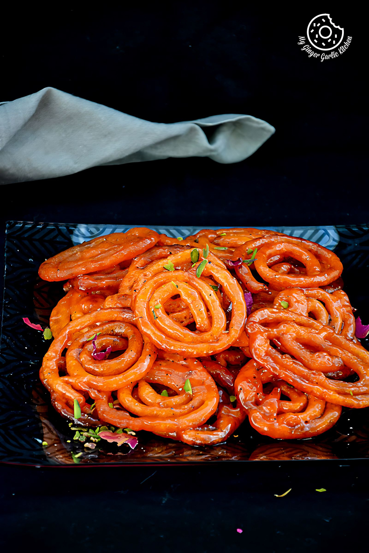 Instant Peach Jalebi Topped with Cream and Pistachio