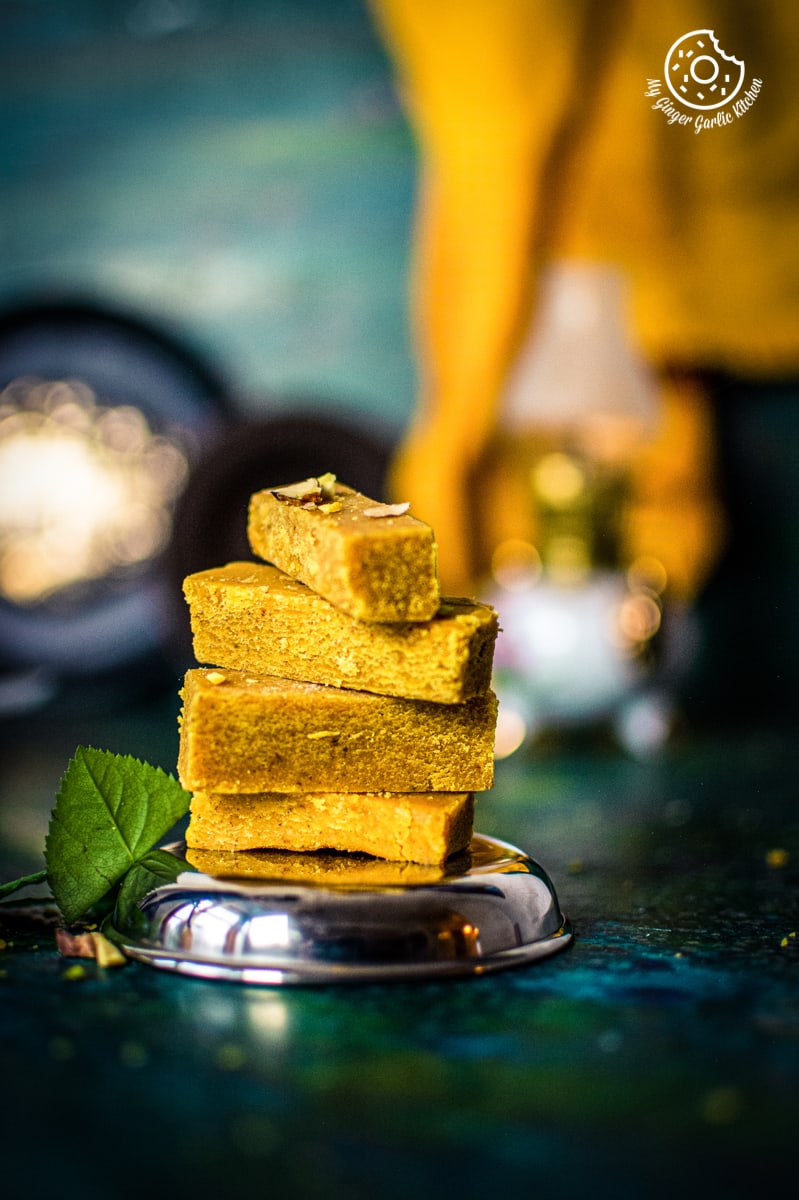 a stack of mysore pak on a steel plate