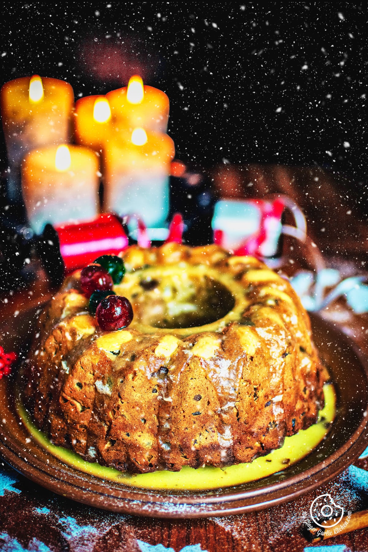 snow falling on a fruit cake