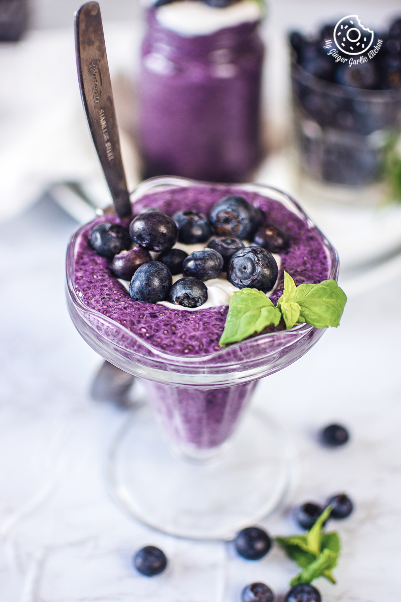 bluberry chia seed pudding in a dessert glass