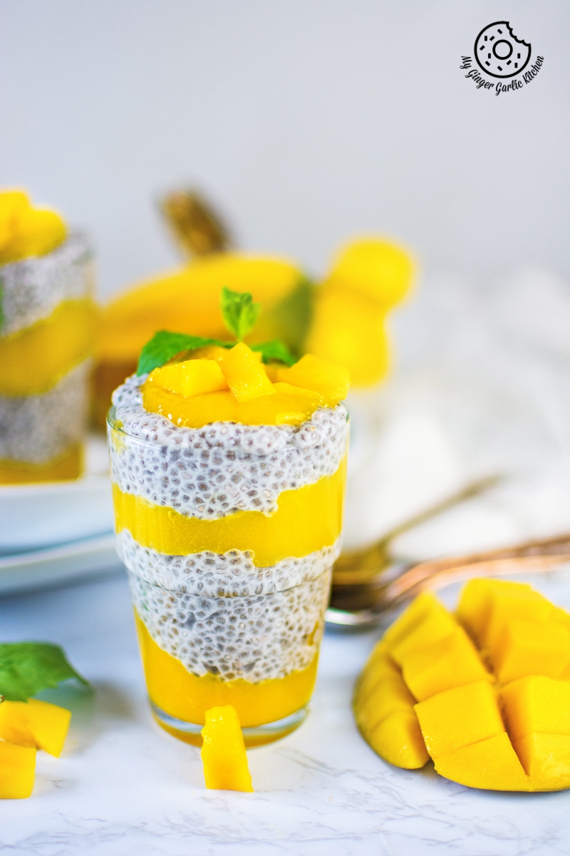 coconut mango chia pudding served in a glass