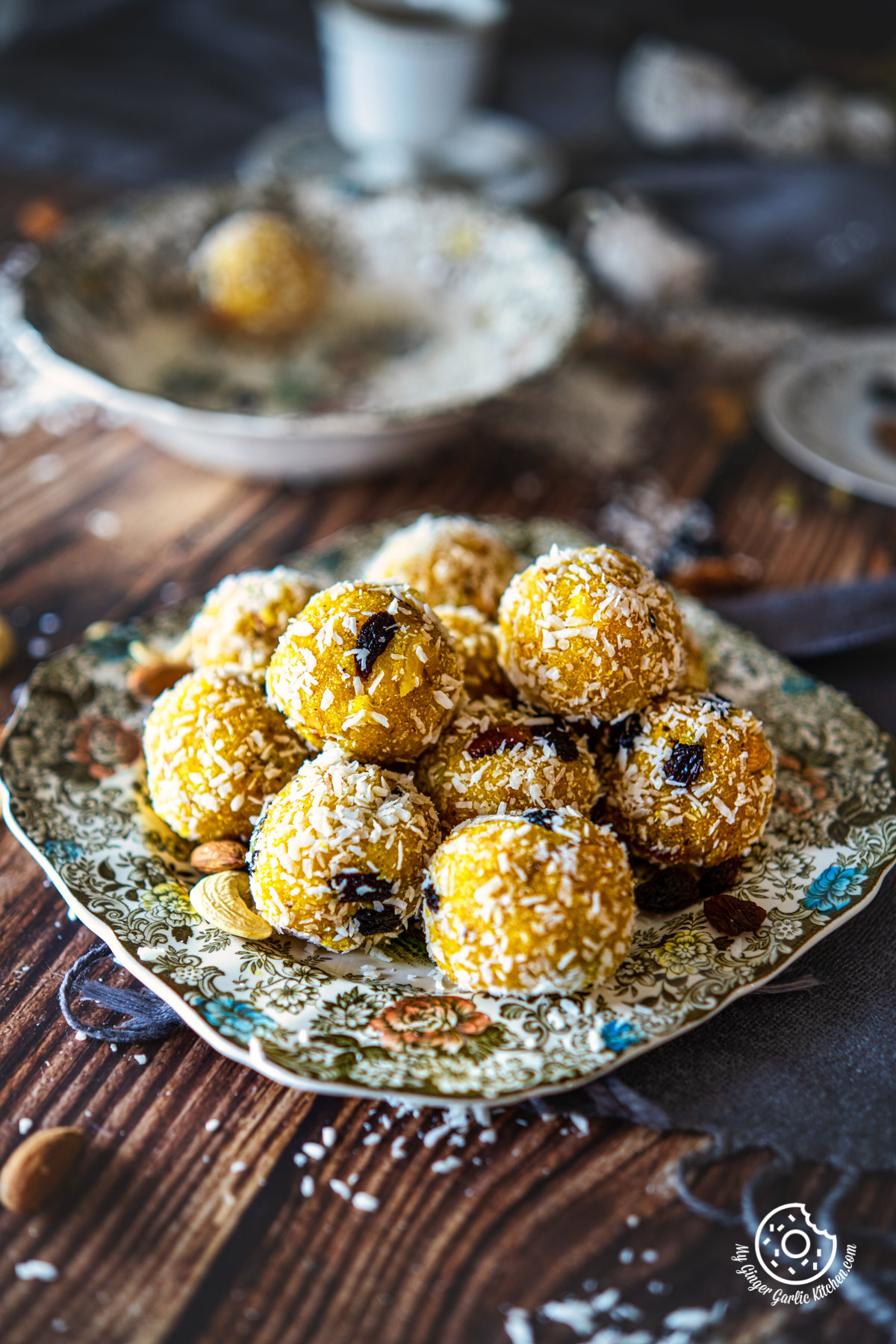 a stack of indian pineapple ladoos piled on floral plate