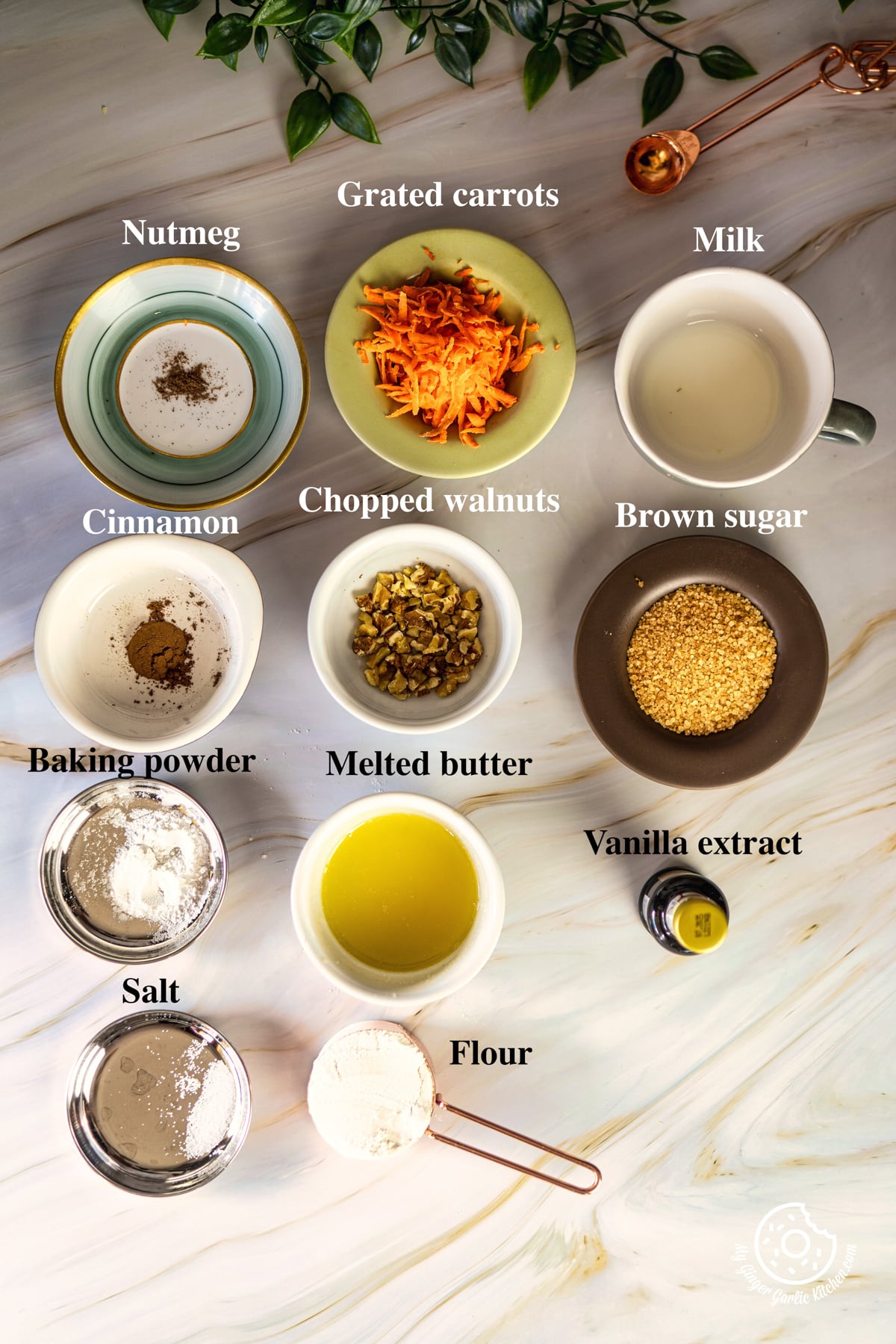 overhead view of carrot cake mug cake ingredients arranged on a flat surface